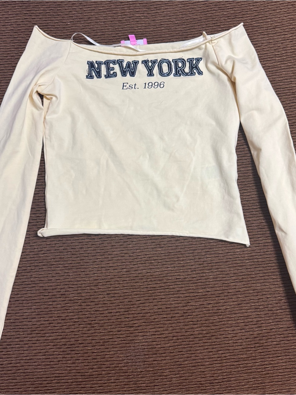 Edikted Cream Off-Shoulder Long Sleeve Top with NEW YORK Print